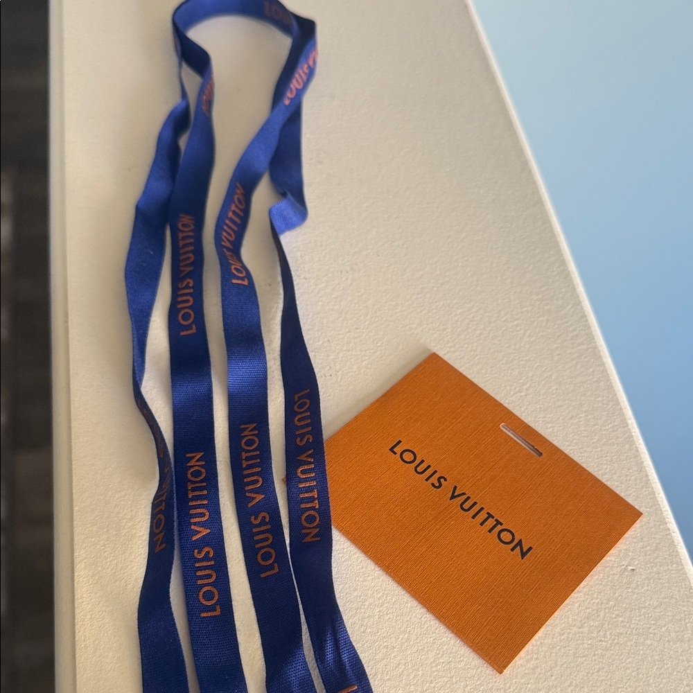 Louis Vuitton Royal Blue Ribbon with Vibrant Orange Tag